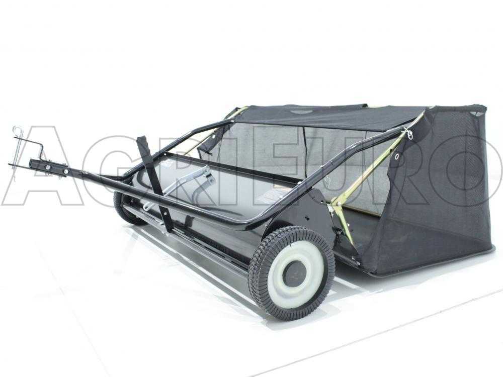 Tow behind grass collector for ride on mower outlet