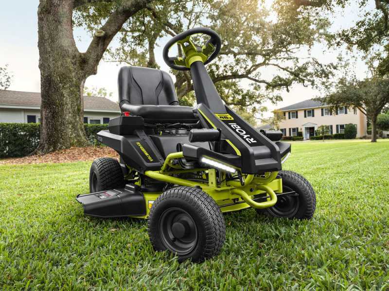 Battery powered top riding lawn mower