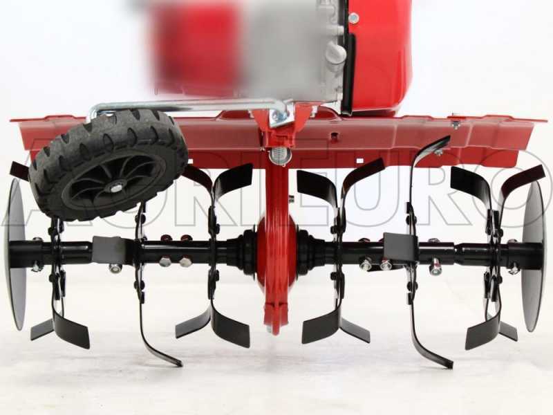 Adjustable tine