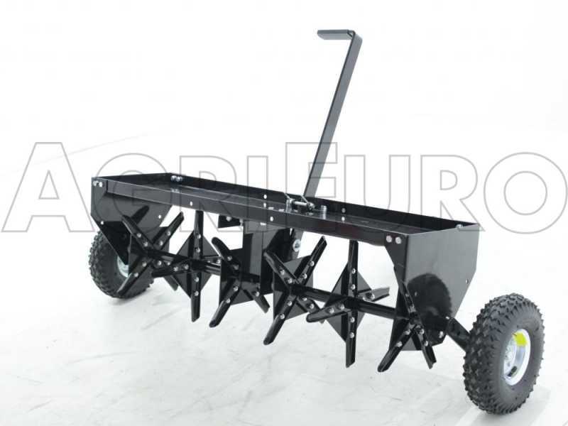 Towed online lawn aerator